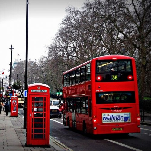 And this photo shows two symbols at once - a red double-decker bus and a phone booth. Whose symbols are they?